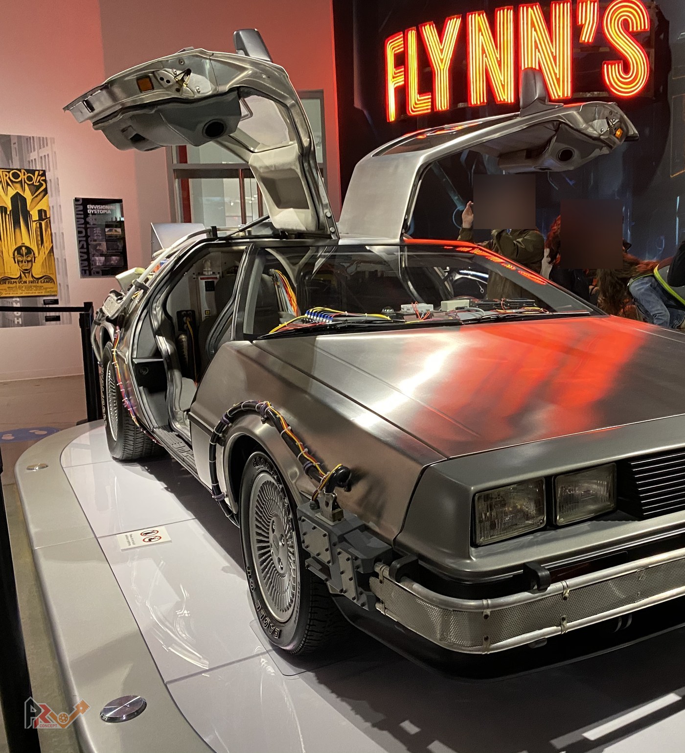 The Back to the Future DeLorean on display at the Petersen Automotive Museum in Los Angeles, gull-wing doors open